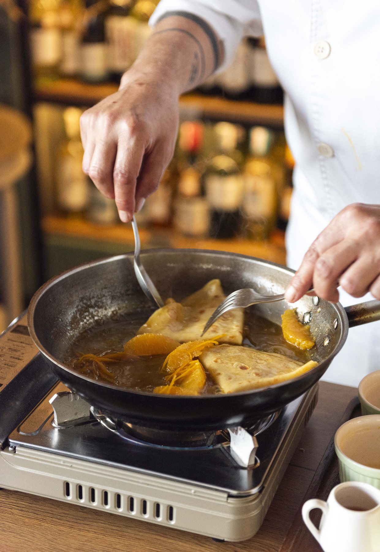 Chef cooking at LA PLANTE