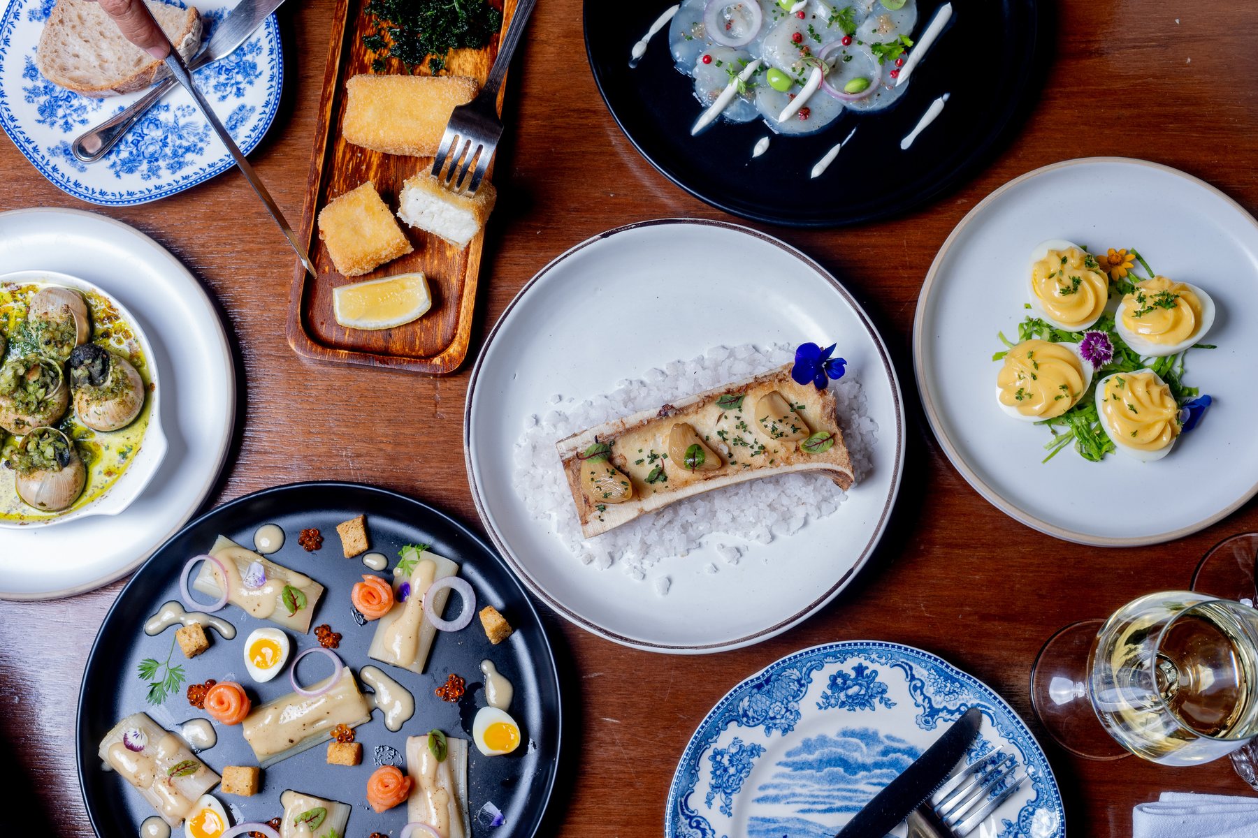 Classic French cuisine spread at LA PLANTE